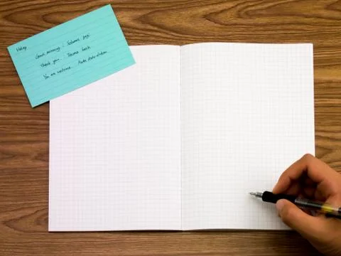 Malay; Learning New Language Writing Words on the Notebook Stock Photos
