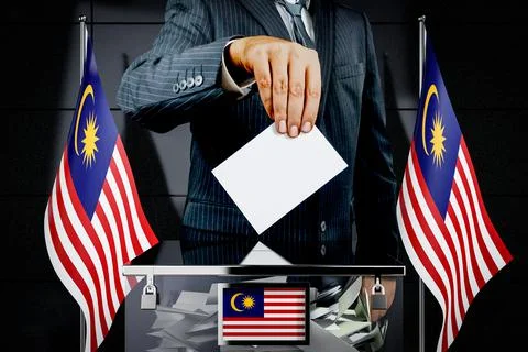 Malaysia flags, hand dropping voting card - election concept Ilustración de archivo