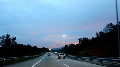 Malaysia highway when the sun sets and sky turning dark Stock Footage 109330513