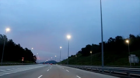 Malaysia highway when the sun sets and sky turning dark Stock Footage 109330558