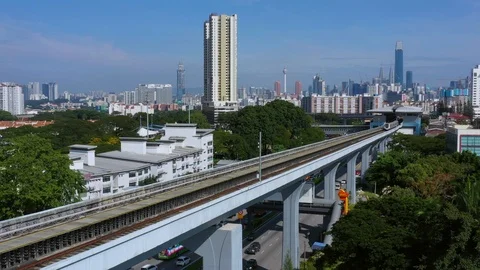 Malaysia Mass Rapid Transit (MRT) train with view of Kuala Lumpur city Stock Footage 120322483