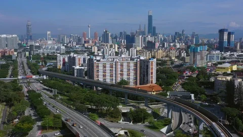 Malaysia Mass Rapid Transit (MRT) train with view of Kuala Lumpur city Stock Footage 120322485