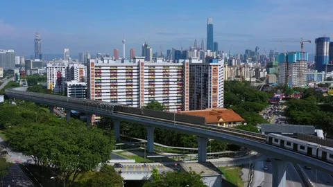 Malaysia Mass Rapid Transit (MRT) train with view of Kuala Lumpur city Stock Footage 120322491