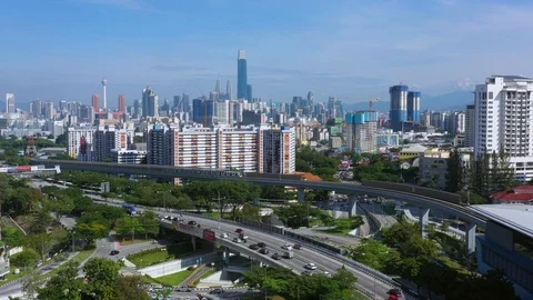 Malaysia Mass Rapid Transit (MRT) train with view of Kuala Lumpur city Stock Footage 120322503