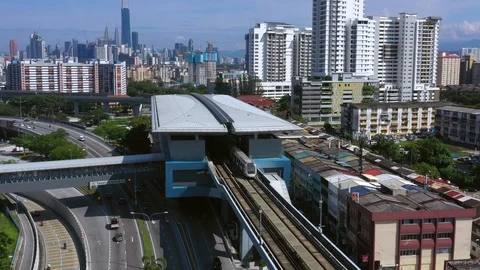 Malaysia Mass Rapid Transit (MRT) train with view of Kuala Lumpur city Stock Footage 120322525