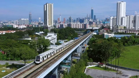 Malaysia Mass Rapid Transit (MRT) train with view of Kuala Lumpur city Stock Footage 120322600