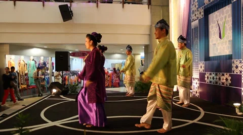 Malaysian dancers perform close side angle Stock Footage 36184105