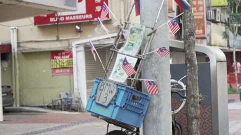 Malaysian flag on a bicycle Stock-Footage 159636929