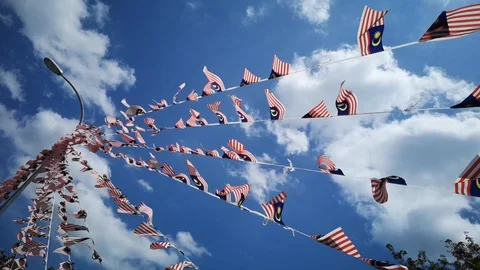 The Malaysian flag is small Stock Footage 94241317