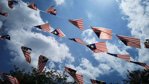 The Malaysian flag is small Stock Footage 94241320