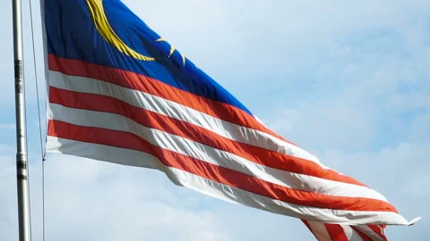 Malaysian flag waving Stock Footage 137983705
