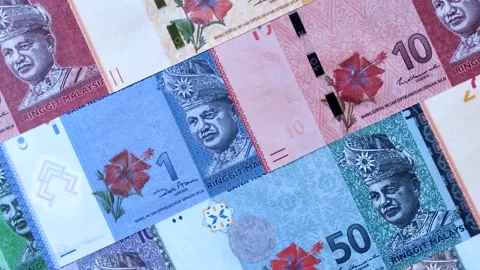 Malaysian ringgit banknotes as a tool for trade and financial transactions. The  Stock Footage 340641081