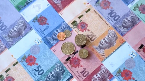 Malaysian ringgit banknotes as a tool for trade and financial transactions. The  Stock Footage 340641143