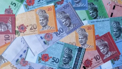 Malaysian ringgit banknotes as a tool for trade and financial transactions. The  Stock Footage 340641420