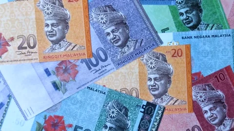 Malaysian ringgit banknotes as a tool for trade and financial transactions. The  Stock Footage 340641444
