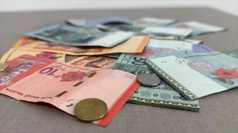 Malaysian Ringgit cash currency close up coins bills notes MYR money RM Stock-Footage 307288277
