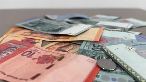 Malaysian Ringgit cash currency close up RM coins bills notes MYR money Stock Footage 307288279