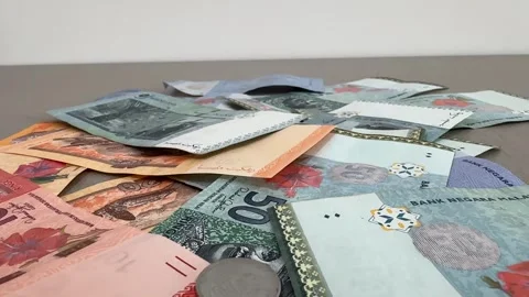 Malaysian Ringgit cash RM currency close up coins bills notes MYR money Stock Footage 307288359
