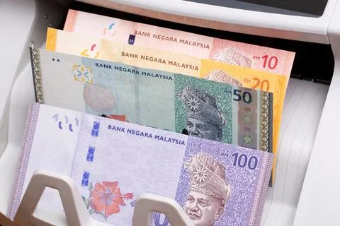 Malaysian ringgit in the counting machine Stock Photos