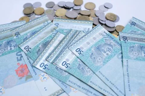 Malaysian ringgit money notes and malaysian coin isolated on white background Stock Photos