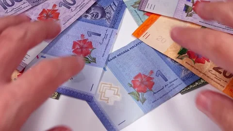 Malaysian ringgit (MYR) banknotes. Selective focus. Slow motion video. Stock Footage 300027099