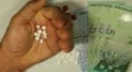 Malaysian Ringgit MYR, Counting Drugs and Money, Health Care, Colorful Pills HD Footage