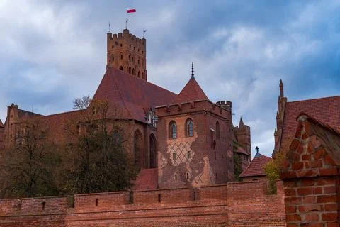 Malbork Castle red brick Gothic fortress with tower and spires Stock Photos
