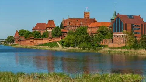 Malbork on the Nogat river the largest medieval brick castle. Stock Photos