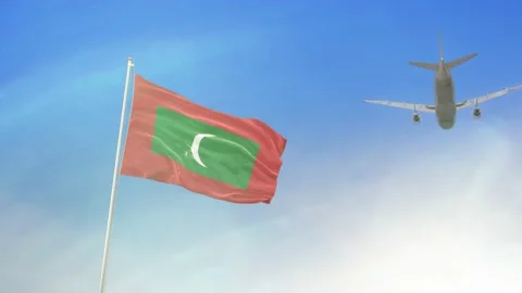 Maldives Flag With Airplane Video stock 131490701