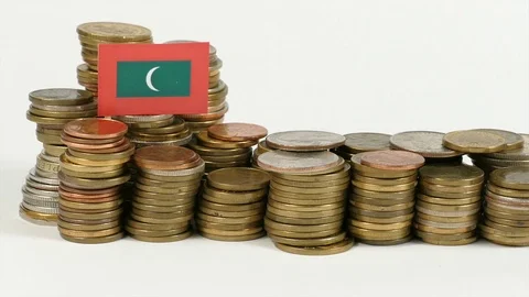 Maldives flag waving with stack of money coins Stock Footage 71984323