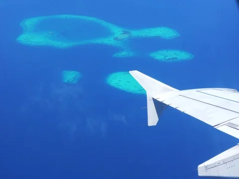 Maldives Islands from plane aerial view, Travel destination paradise view 4k Stock Footage