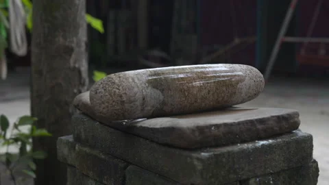 Maldives stone rolling pin Stock Footage 167549516