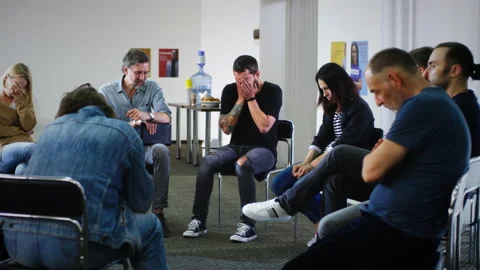Male addict crying during group meeting Stock Footage 157071982