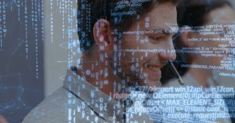 Male agent speaking into headset after incoming support call, animated code Stock Footage 334312763