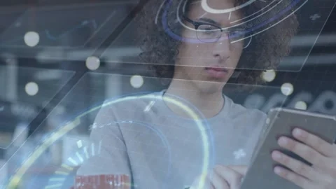 Male analyst tapping tablet starting data overlays explaining smarter portfolio Stock-Footage 330161733