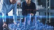 Male And Female Architects Work With Holographic Augmented Reality 3D City Model Stock Footage
