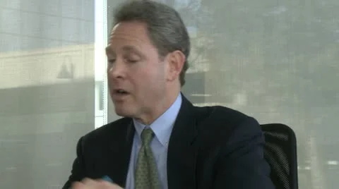 Male and female colleagues exchange ideas (1 of 2) Stock Footage