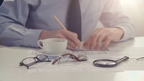 Male architect draws a construction project Stock Footage 74415707