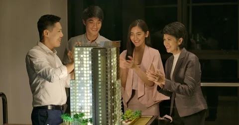 Male architect making presentation on an architectural model. Video stock 113062139