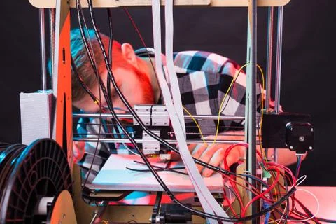 Male architect using 3D printer in office Stock Photos