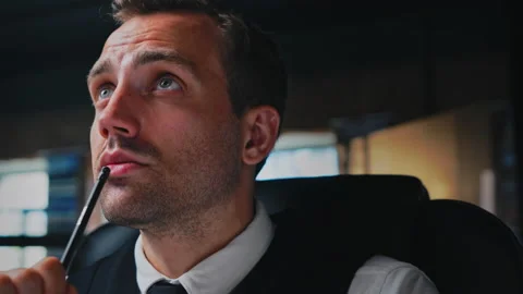 Male architect working, thinking in the office on a residential building project Stock Footage 201469162