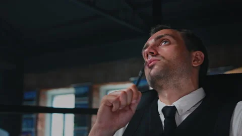 Male architect working, thinking in the office on a residential building project Stock Footage 202121625