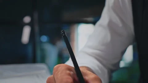 Male architect working, thinking in the office on a residential building project Stock Footage 205324220