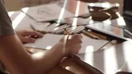 Male Artist Hand Sketching Sofa With A Pencil On A Light Day Stock Footage