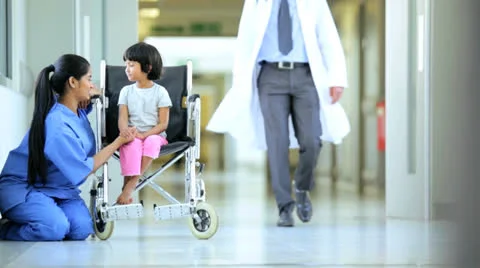 Male Asian Indian Pediatric Doctor Child Patient Hospital Corridor Stock Footage