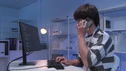 Male Asian IT freelancer programmer coding application software in room. Stock Footage 319609755