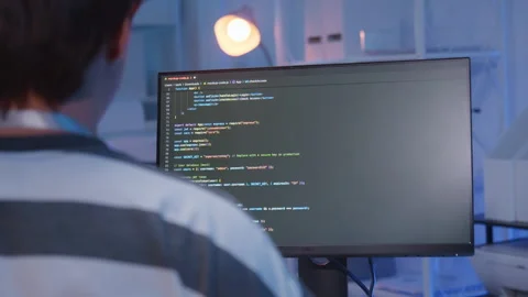 Male Asian IT freelancer programmer coding application software in room. Stock Footage 320523143