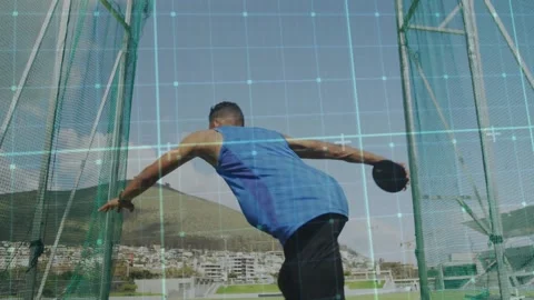 Male athlete doing discus throw after stride in cage grid overlay tracking Stock Footage 331045510