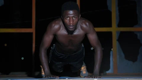 Male Athlete Doing Push Ups In The warehouse Stock Footage 115790243