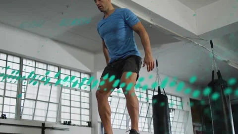 Male athlete loading hips, swinging arms, jumping onto plyo box for fitness, Stock Footage 332405151